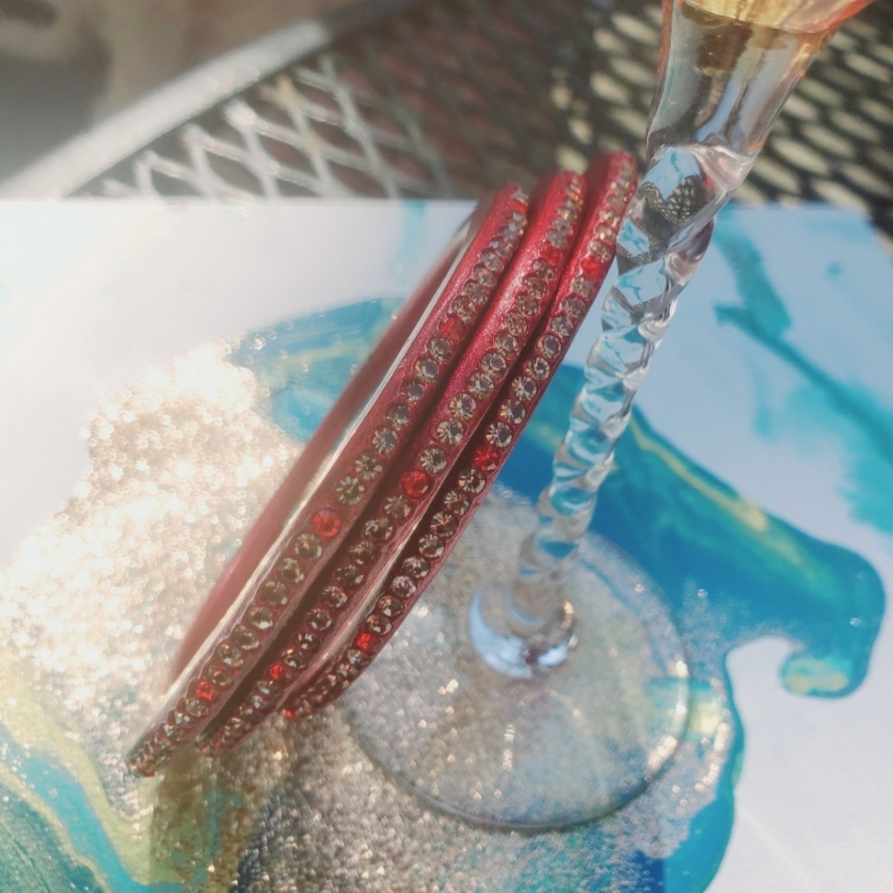 FOUR UNIQUE RUBY RED WOODEN BRACELETS WITH RED AND DIAMOND LIKE CRYSTALS